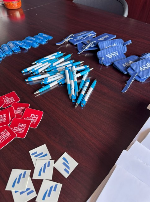 Picture of ASA pens, temporary tattoos, phone wallets
